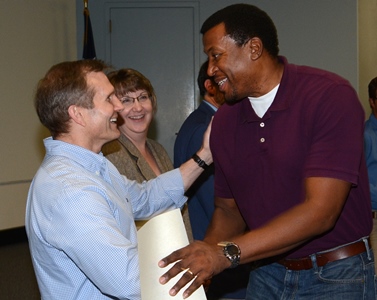 Jim Haynes, left, congratulates Lennon Mings