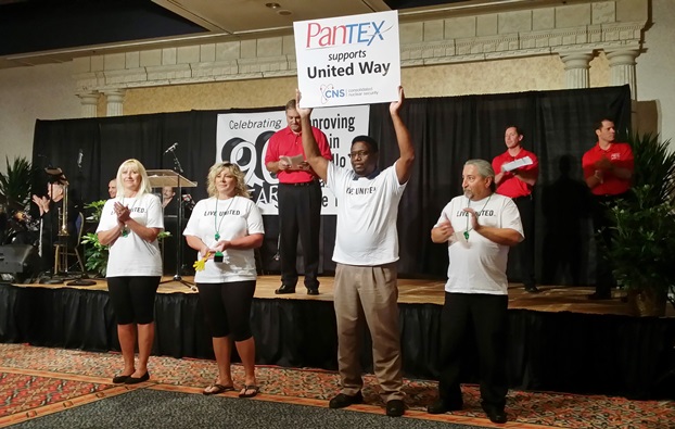 Clarence Rashada holds up a sign expressing Pantexan support during the United Way Clarence Rashada holds up a sign expressing Pantexan support during the United Way