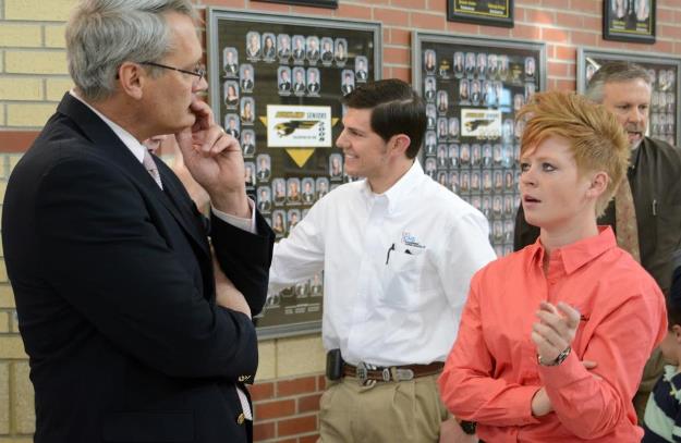 Don Wood (left), Bushland ISD Superintendent, discusses how the CNS donation will help the Bushland robotics program with Savannah Gates, a CNS Pantex engineer and 2008 Bushland graduate. Don Wood (left), Bushland ISD Superintendent, discusses how the CNS donation will help the Bushland robotics program with Savannah Gates, a CNS Pantex engineer and 2008 Bushland graduate.