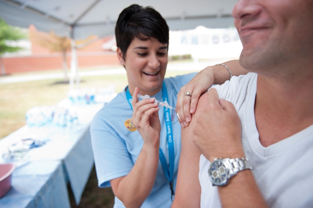 Melissa Davis gives the flu vaccine Melissa Davis gives the flu vaccine