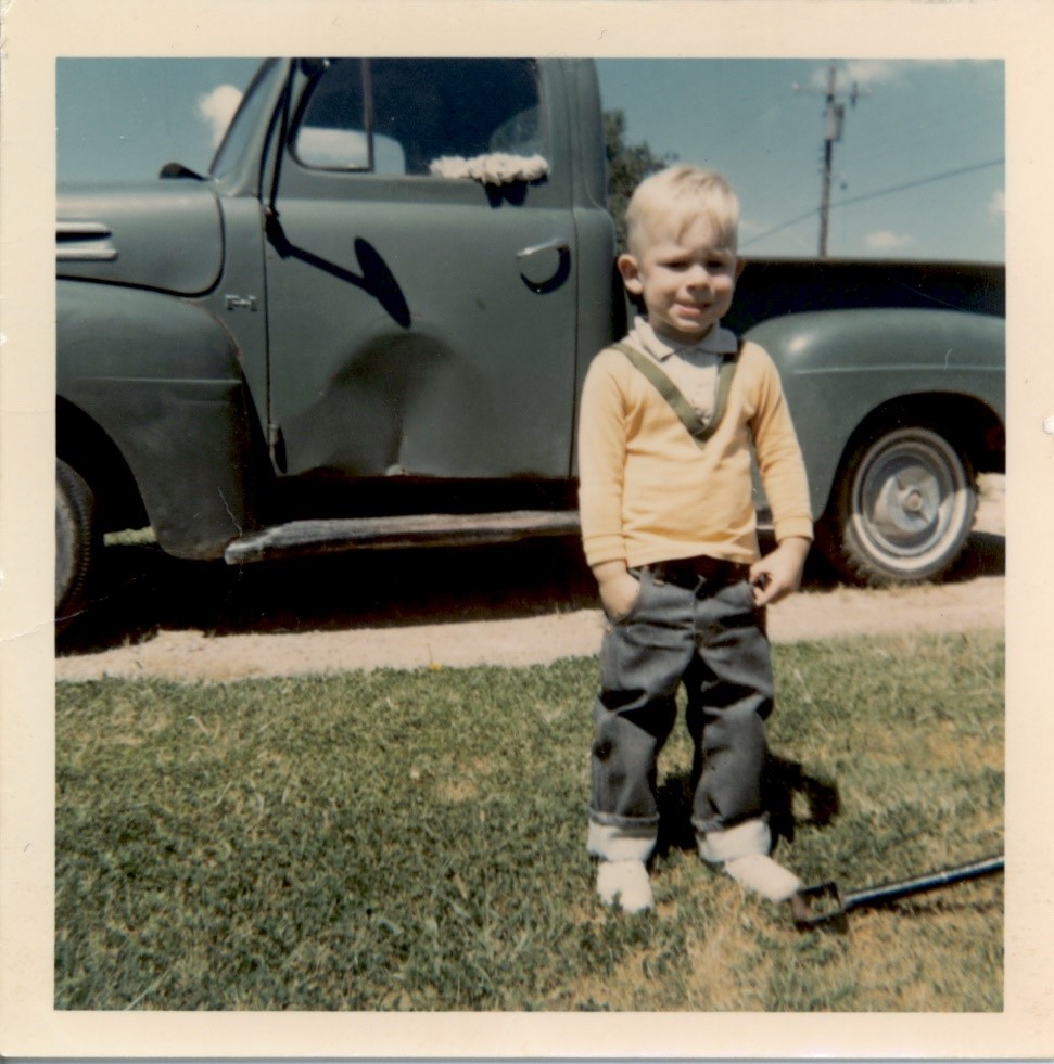 Brian Fowler, mid 1960s in front of his dad’s truck in Pantex Village Brian Fowler, mid 1960s in front of his dad’s truck in Pantex Village