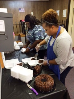Allison Roberts cuts cake