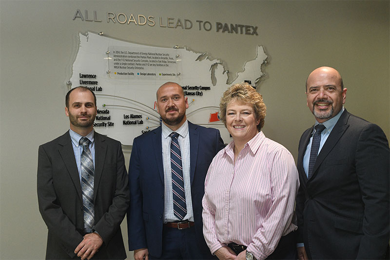 Pantex Small Business Program Manager Ryan Johnston (l), SAM Engineering & Surveying, Inc. President Saul Maldonado, Pantex Supply Chain Manager Kelly Delgado-Goudschaal, and SAMES, Inc. Chief Executive Officer Samuel Maldonado