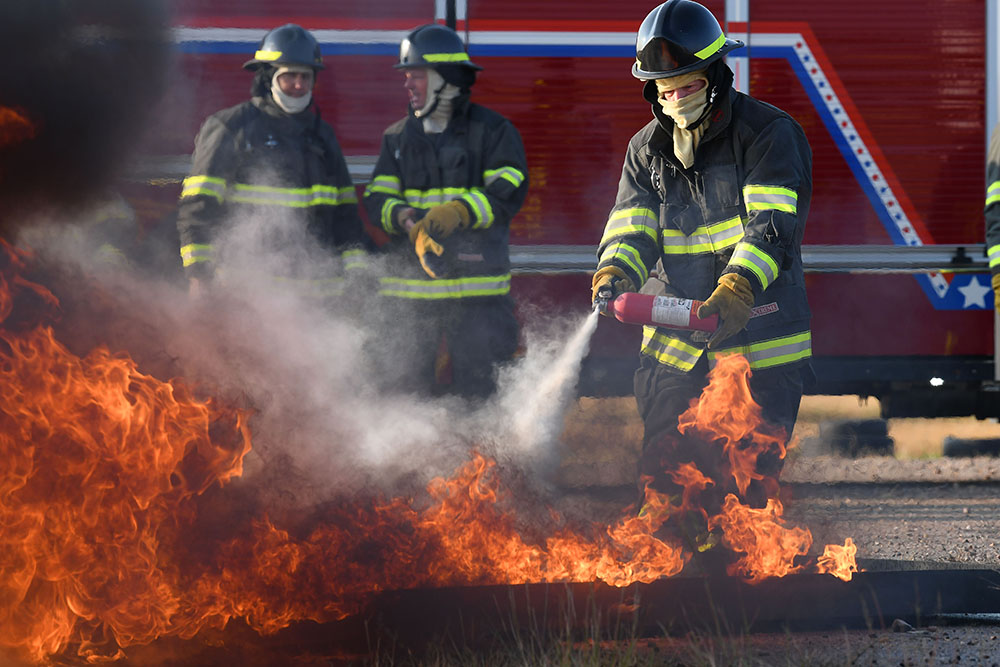 Firefighters containing a blaze