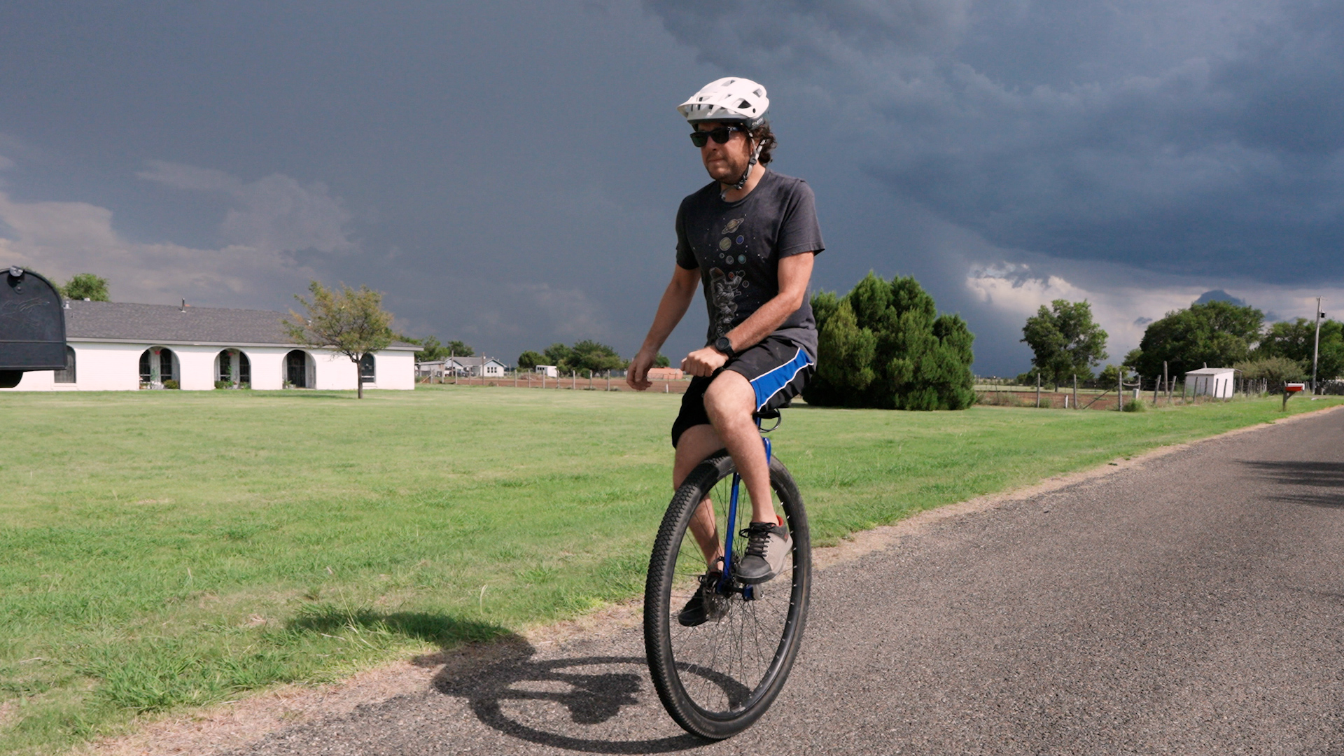 Bryce Garrett riding a unicycle.