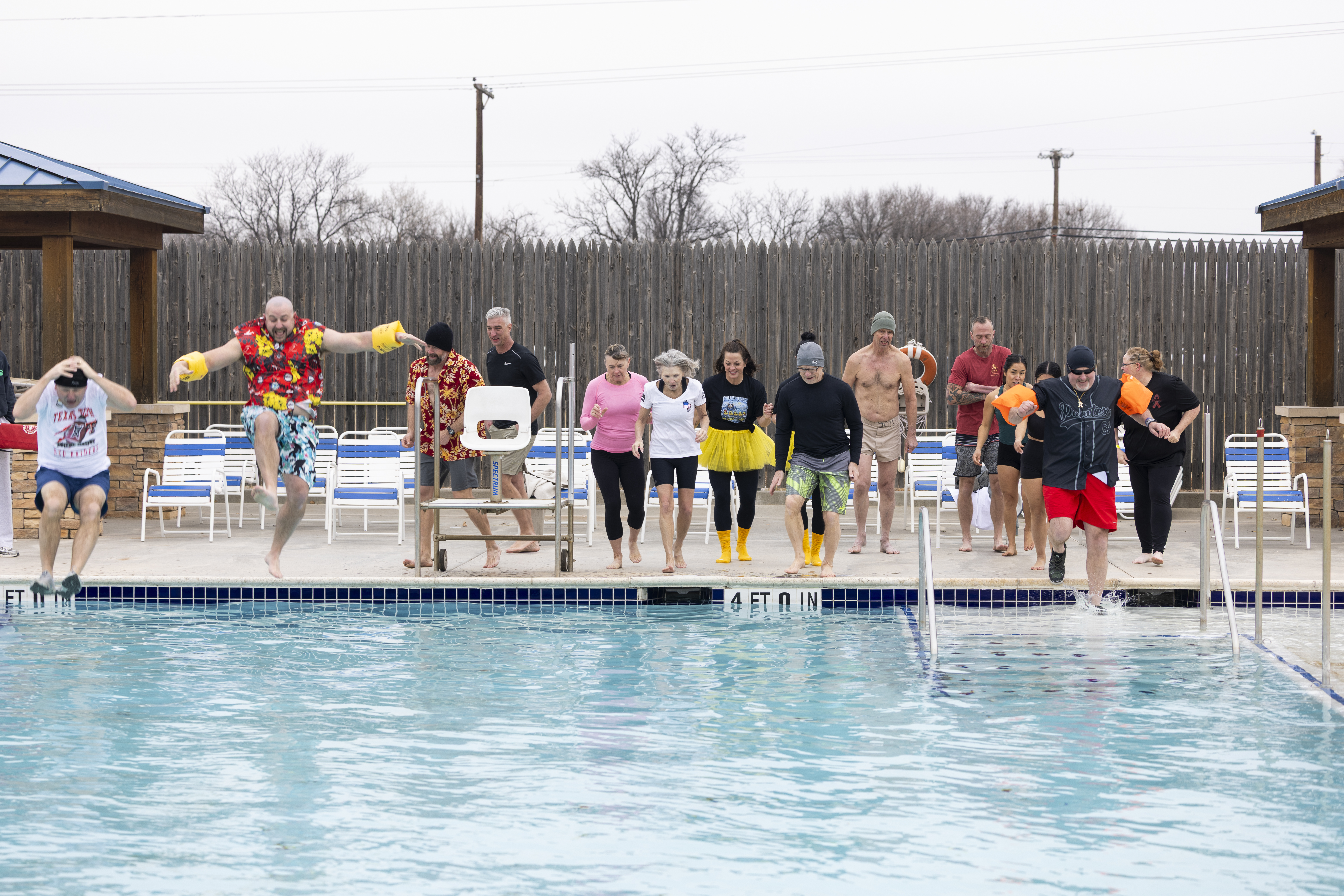 A group of Pantexans jumps into freezing water in 24-degree weather in support of the Amarillo Polar Plunge. A group of Pantexans jumps into freezing water in 24-degree weather in support of the Amarillo Polar Plunge.