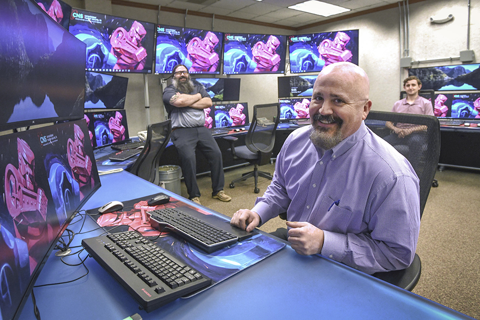 Personnel are shown in the NOC/SOC Control Room Personnel are shown in the NOC/SOC Control Room